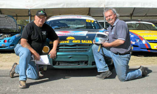 Motorsport identity Bobby McGee and Ford Falcon driver Dave Rogers at Morgan Park yesterday. Motorsport identity Bobby McGee and Ford Falcon driver Dave Rogers at Morgan Park yesterday.